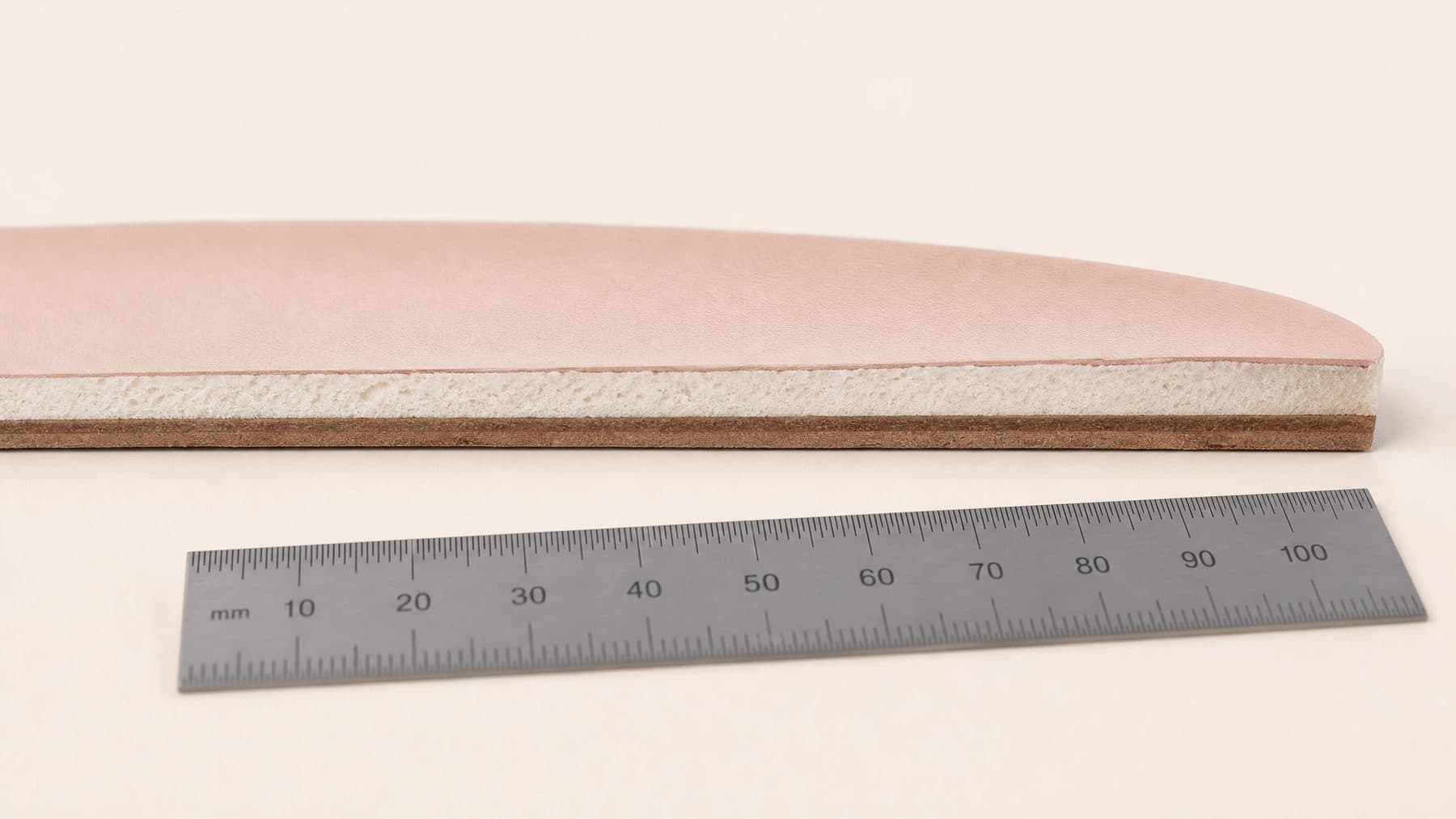 Cross-section of the Loafer Penny footbed showing 8 mm of padding under the forefoot, against a millimetre rule.