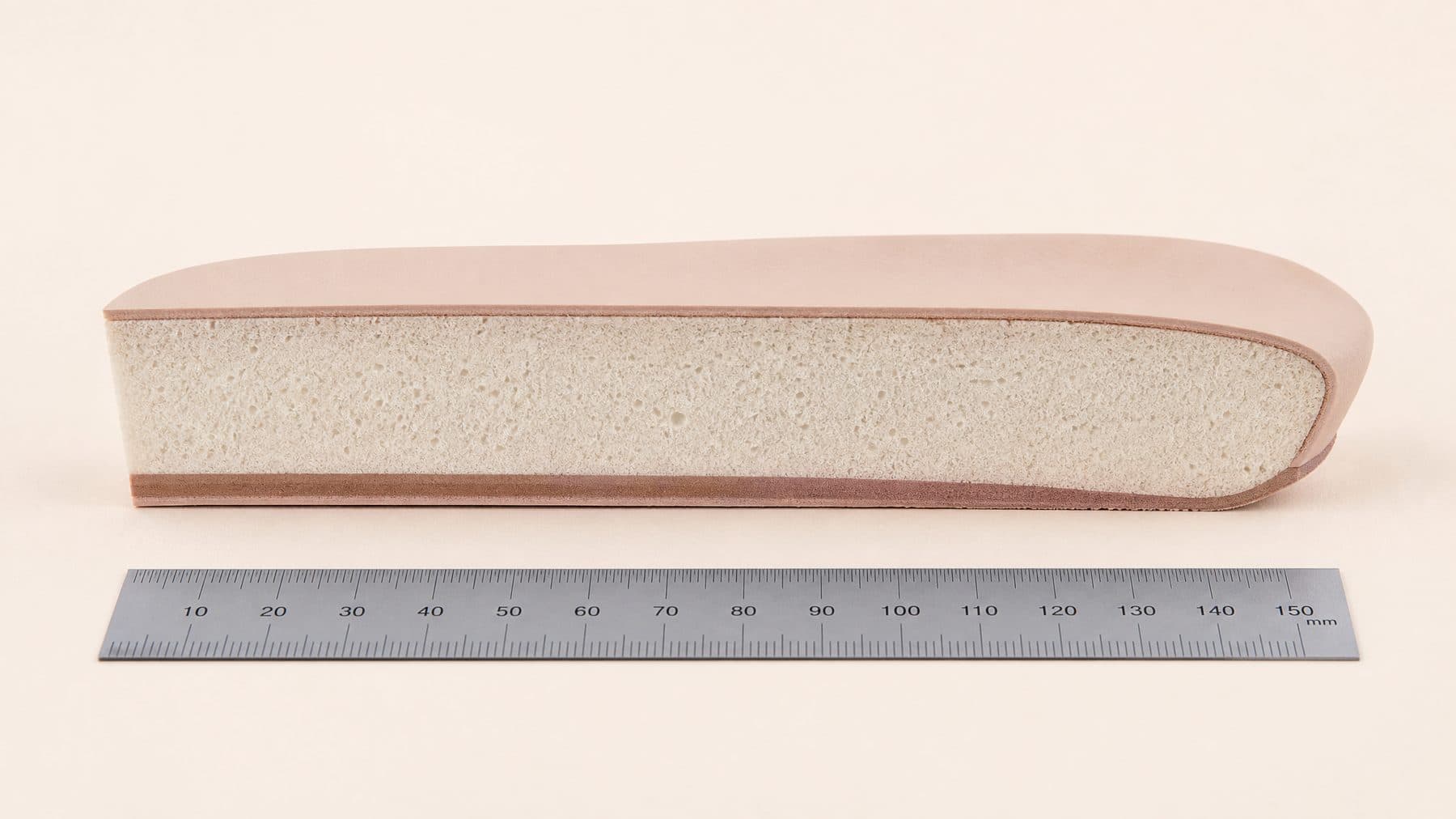 Cross-section of the Block Premium footbed showing 14 mm of padding under the forefoot, against a millimetre rule.